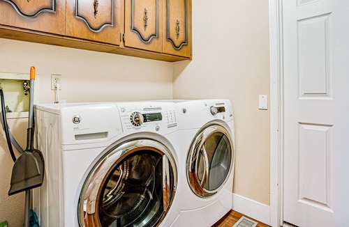 University Place House | Lovely home with nearby beach access, patio, hammock and washer/dryer