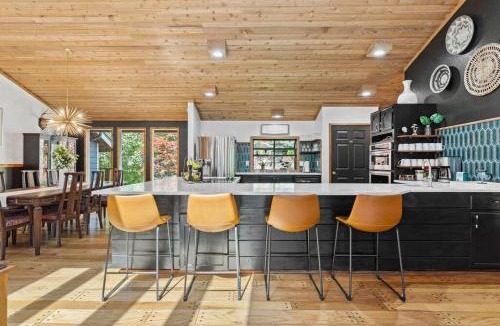 Nine Mile Falls House | Luxe Lake Home Hot Tub Private Dock Beach