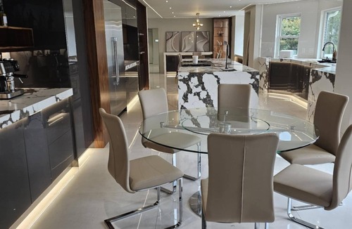 Eagle House | Luxurious 5-bedroom house in serene Eagle with sauna, pool, and fitness room.