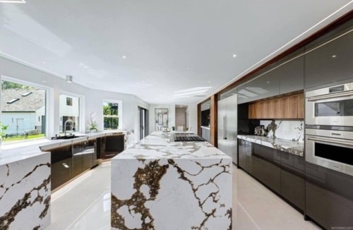 Eagle House | Luxurious 5-bedroom house in serene Eagle with sauna, pool, and fitness room.