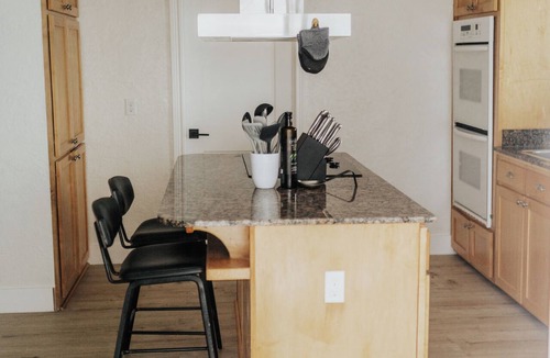 Mullan House | Luxury adventure hub, game room,fire pit, well-appointed kitchen, stunning view!