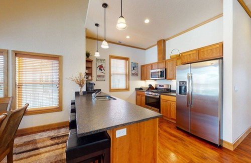 Dover Bay Condo | Luxury condo with private deck, pond views, fast WiFi, boat launch & more