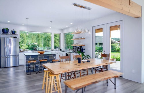 Libby House | Luxury Home on the Kootenai River with Panoramic Cabinet Mountain Views