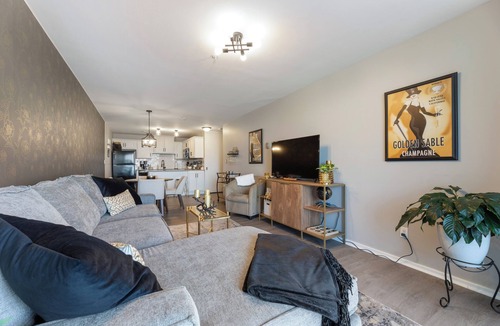 Midtown Crossing Condo | Luxury Mid-century Condo, Cozy & Fully Remodeled. Stocked with Many Extras!