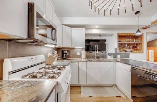 Four Corners House | Magnificent willow shade trees, waterfall, and sleeping comfort. Book this Home!