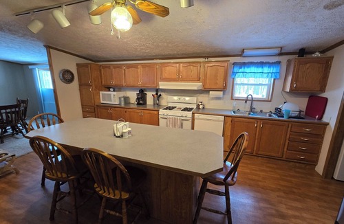 Mancelona House | Mancelona Beer Garden, 20 private wooded acres, 3bed, 2 bath, sleeps 10