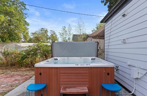 West Central House | Modern 2BR/2BA retreat for 6 with hot tub & stocked kitchen.