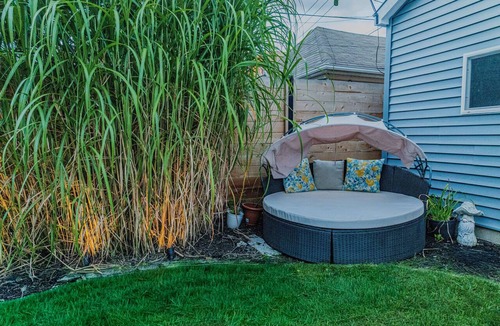 Logan Square Apartment | Modern 3-Bed Stay w/Patio, Firepit, & Garage Parking Spot