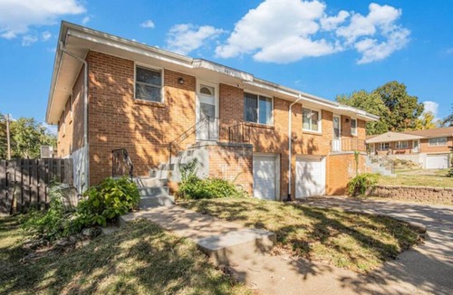 North Central Omaha House | Modern 4BR NW Omaha, Garage, Fenced Yard, EV Charger, W/D, Pet-Friendly