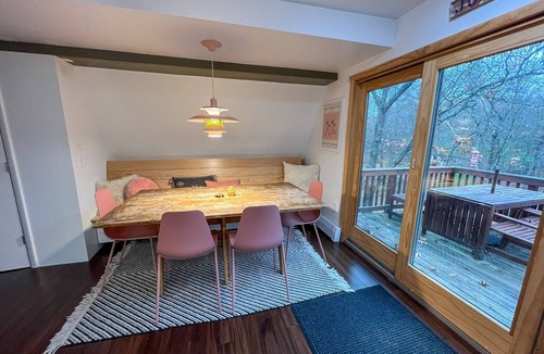East Tawas Ski Chalet | Modern A-Frame on fenced, wooded Lot. Pet friendly!