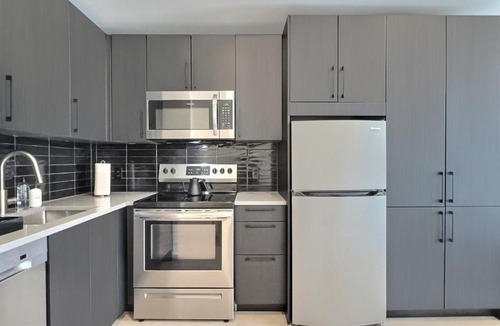 Five Points South Apartment | Modern Bham Getaway, Steps to Railroad Park and Eats