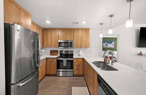 Downtown Salt Lake City Apartment | Modern Downtown 2BR 2BA Near Delta Center with Fire Pit, BBQ, and City Views