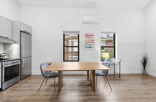 Olde Towne East Apartment | Modern Executive Loft | Work-Ready Mezzanine