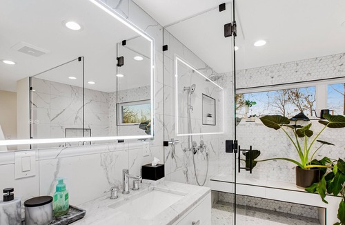 Milton House | Modern home with outdoor fireplace, rock-wall, & walk-in shower