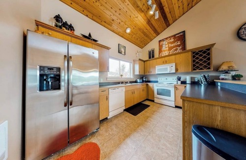 Big Sky Condo | Mountain-view gem with fireplace, garage, washer/dryer & alfresco dining