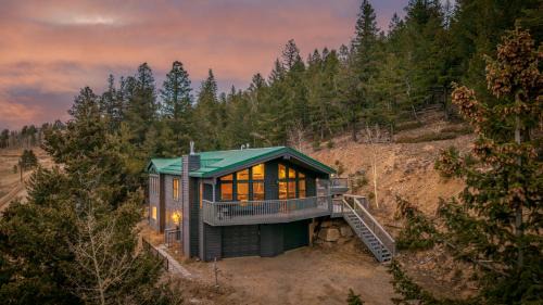 Black Hawk House | Mountain View Retreat - Game Room, 2 Living Areas, Hot Tub, Fire Table