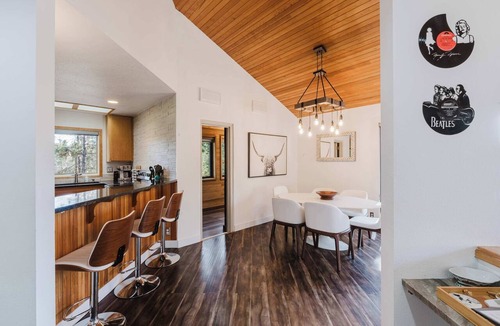 Overlook Park House | Multi-level home with private hot tub, decks, and SHARC passes provided