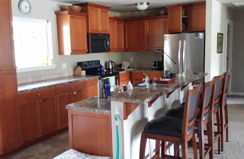Olympia House | New, 2017 green built home on acre of wooded, private, intimate, lakefront.