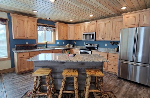 Island Park Cabin | New construction, hot tub, 10 miles to Yellowstone, WiFi, AC, firepit, Tipi