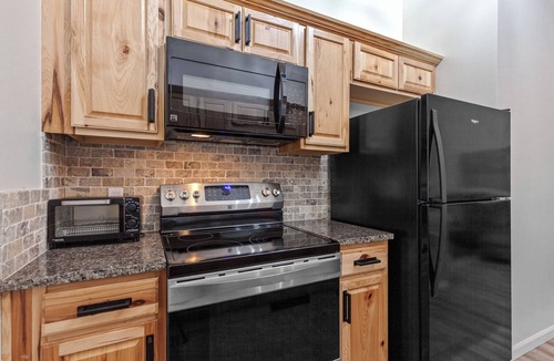 Rathdrum Condo | New Listing! Resort Lake Condo | Prime Location | Fire Pit