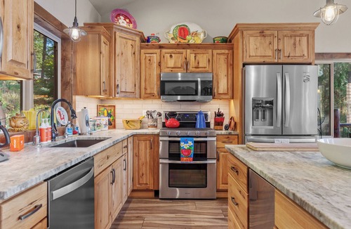 Rockford Bay House | New Listing! The Ultimate CDA Lakehouse | Views, Private Dock & Decks