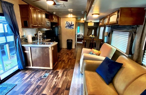 Milton RV Rental | Nice 40’ RV with all modern conveniences, (full kitchen, bathroom, separate bedroom), in private Resort/campground, pool, hot tub, sauna, clubhouse available to all guests.