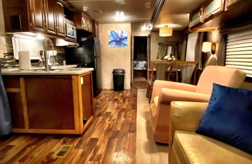 Milton RV Rental | Nice 40’ RV with all modern conveniences, (full kitchen, bathroom, separate bedroom), in private Resort/campground, pool, hot tub, sauna, clubhouse available to all guests.