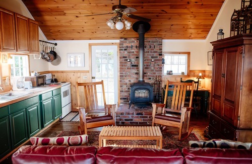 Olga Cottage | Old Island Charm with Stunning Mountain Views, Perched above Our Private Beach