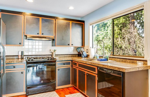 Bonney Lake House | Peaceful lakefront home with firepit, hot tub, pool table, dock, balcony, & deck