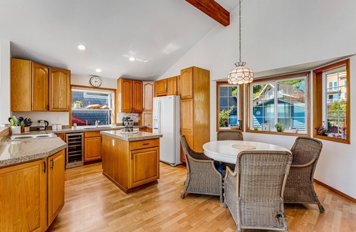 Clinton House | Perfect beach house with stunning views, hot tub & firepit - steps to the water