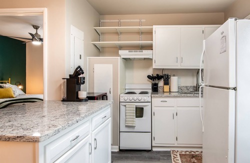 Five Points South Condo | Perfect Location | Vulcan’s Hideout B4 | King Bed