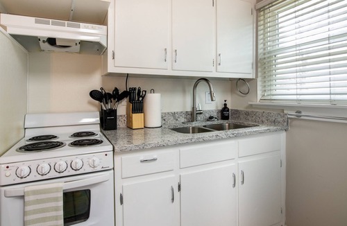 Five Points South Condo | Perfect Location | Vulcan’s Hideout B4 | King Bed