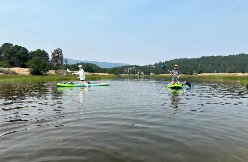 Cascade House | Pet-Friendly Riverfront Getaway with Outdoor Entertaining & Bonus Camper in Cascade, Idaho