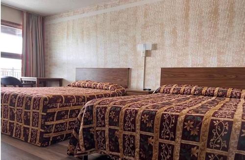 Devils Lake Hotel | Pet-Friendly Room for a Perfect Family Getaway! Free Onsite Parking