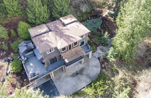 Bonney Lake House | Private custom entertaining home on the hill w view of valley & river