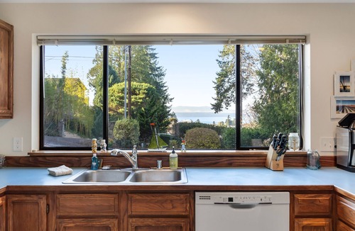 The Bowl of Edmonds House | Quiet Puget Sound view home near downtown Edmonds with a fireplace