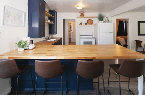Gold Hill Cottage | R&R on the Rogue River! This 2 BR cottage in Gold Hill features a private hot tub with stunning scenic views. Enjoy a spacious, private setting perfect for relaxation, adventure, or remote work