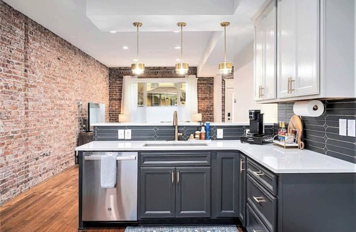 Downtown Omaha House | Rare Omaha Brownstone Retreat! 2 Kings and Garage!