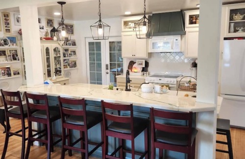 Nampa Other | Red Roof Farmhouse has beds for 27, a 12 person swim spa, 1350 sq ft activity rm