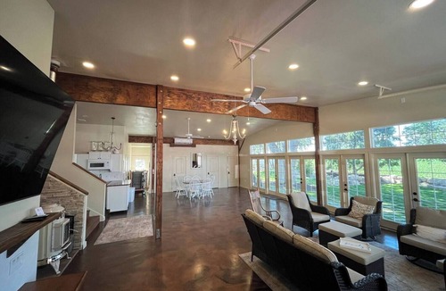 Nampa House | Red Roof Farmhouse large gathering space sleeps 27+ hot tub treehouse