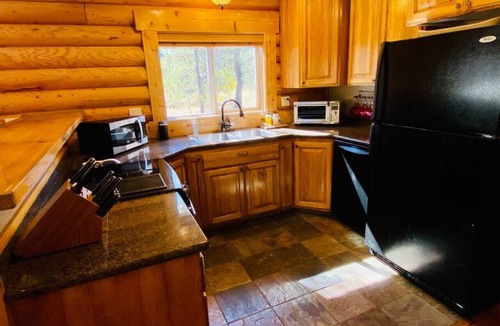 Tamarack Resort Cabin | Relaxing 5 Bedroom Log Cabin with Large Backyard