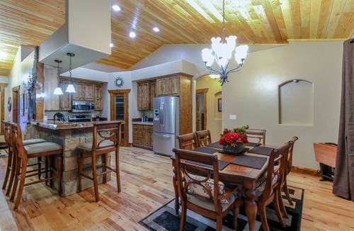 Tamarack Resort Cabin | REMOTE CABIN WITH HOT TUB, MOVIE THEATER AND HUGE COVERED DECK WITH FIRE TABLE