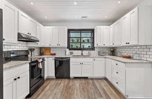 McCall House | Rio River Lodge- Riverfront home in McCall with sauna, hot tub, game room