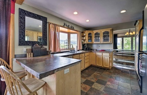 Tamarack Resort Apartment | Riverfront Lodge | Sleeps 22+ | Hot Tub & Fire Pit | Private Beach | Ride-Out Snowmobile & ATV Access | Sports Bar & Game Room | Gourmet Kitchen | Between Tamarack & Brundage Ski Resorts
