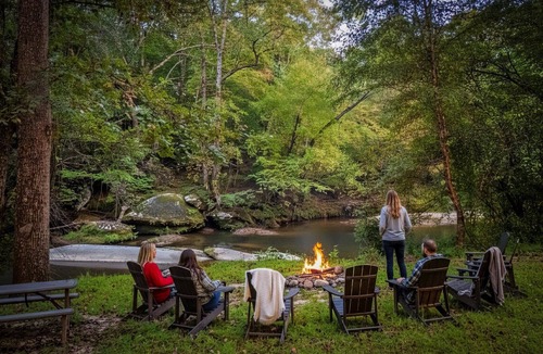 Mount Airy Cabin | Riverfront Log Cabin | Pool, Hot Tub, Tree Fort, Game Room, Fire Pit, Disc Golf