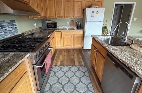 Roscommon House | Riverfront Retreat AuSable River Fly Fish Kayak Canoe Hike