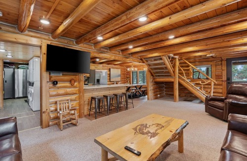 Island Park House | Riverfront Reunion| 3 Cabins, River Front, Private Dock, & Hot Tub!