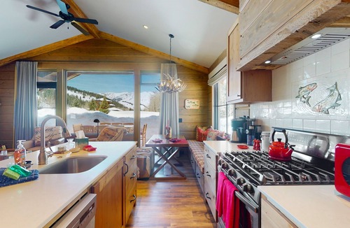 Sun Valley House | Riverside cabin with mountain views, fireplace, covered patio, firepit, & W/D