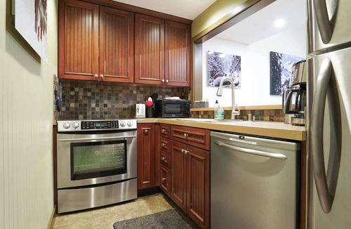 Glacier Condo | Riverside Condo w/Indoor Pools & Hot Tub Access