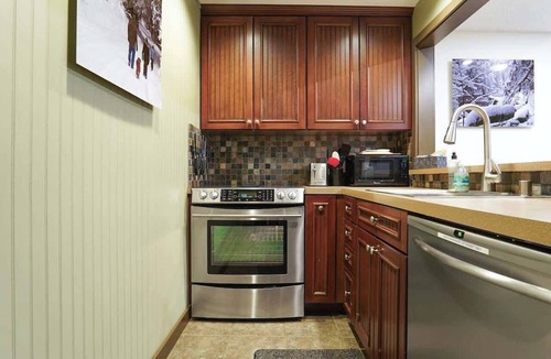 Glacier Condo | Riverside Condo w/Indoor Pools & Hot Tub Access